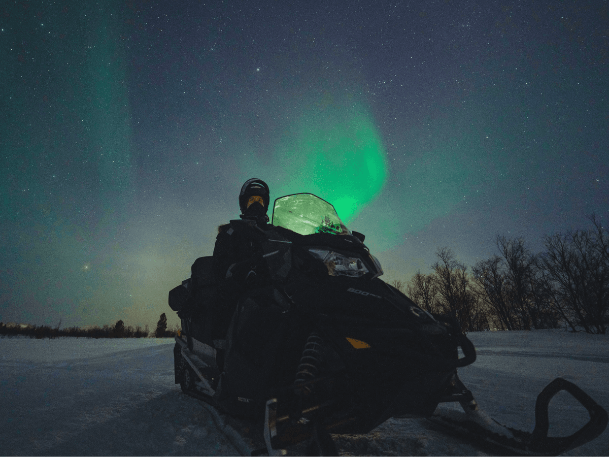 Hunting the Northern Lights by Snowmobile photo 2